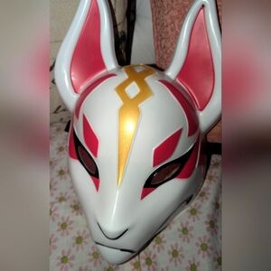 Stylish Fox Mask with Gold and Red Accents